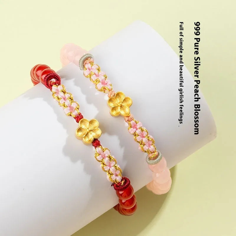 Chinese style hand-woven red rope bracelet with diamond crystal and peach blossom design in pink or red agate.