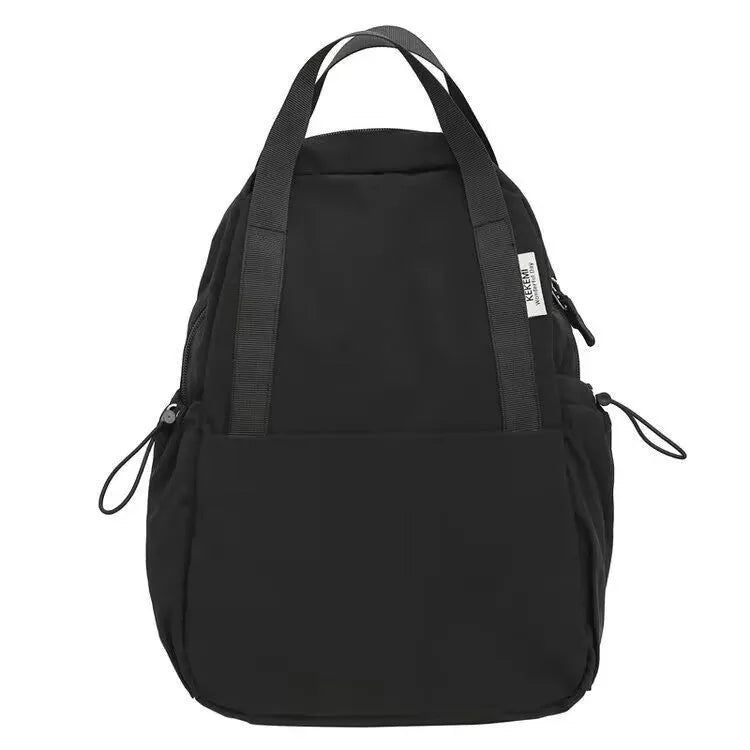 Simple solid colour nylon backpack shown in blue, with curved shoulder straps and a front lock.