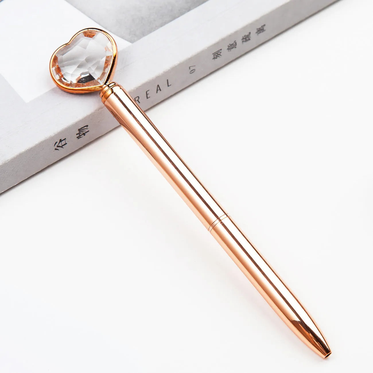 Golden Love Ball Crystal Diamond Metal Pen on a white background.