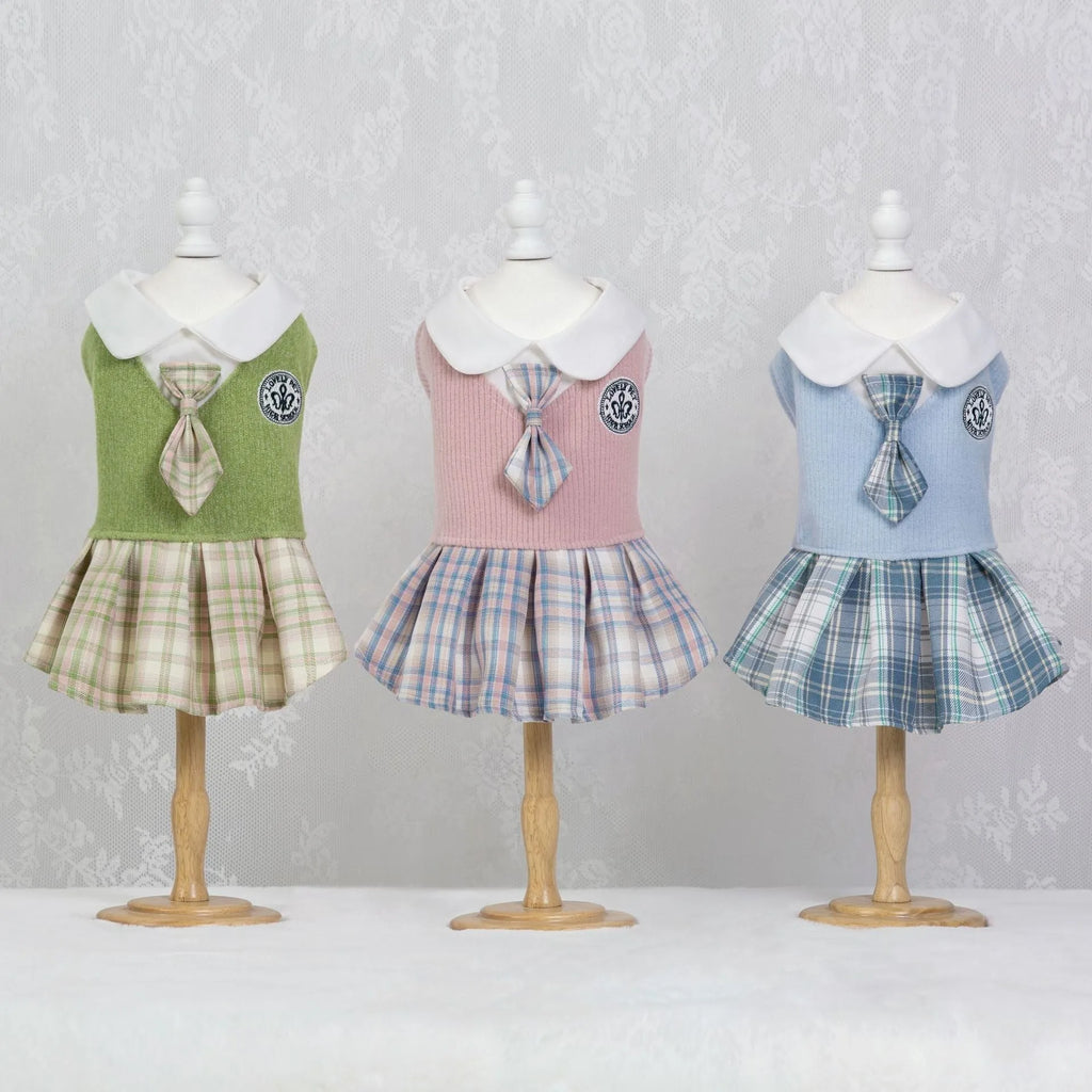 Pink tartan princess-style skirt for small dog on white background showing full skirt design
