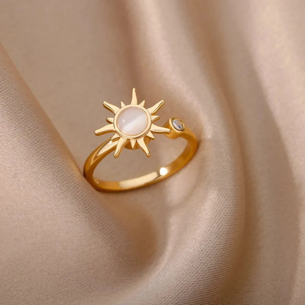 Simple geometric gold adjustable fidget ring with rotating band on a finger