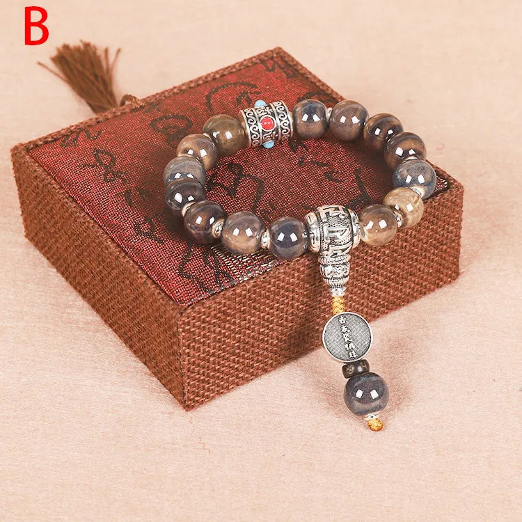 Men's gradient ceramic chain bracelet in coloured glaze, polished finish, showing colour variation.