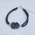 Hand-carved obsidian climbing cat bracelet with natural K2 stone and Korean-style design