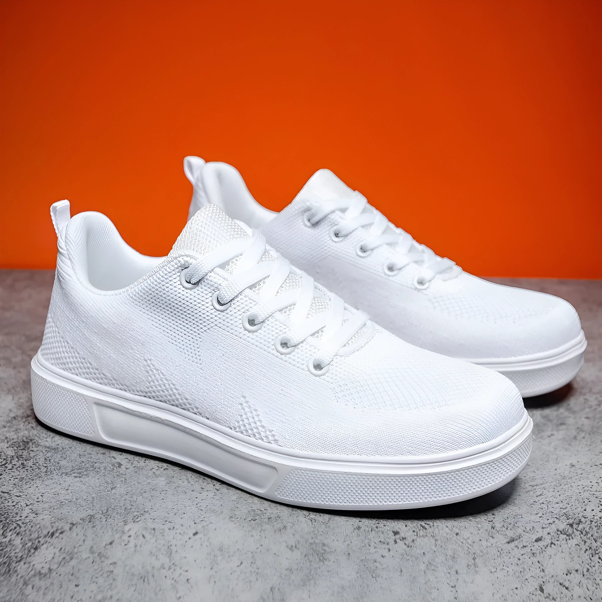 Flat heel casual board shoes with mesh upper and EVA sole in black or white colours