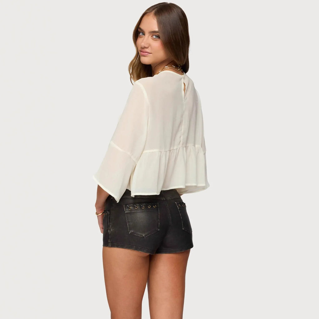 Milky white women's chiffon t-shirt with long batwing sleeves on a hanger