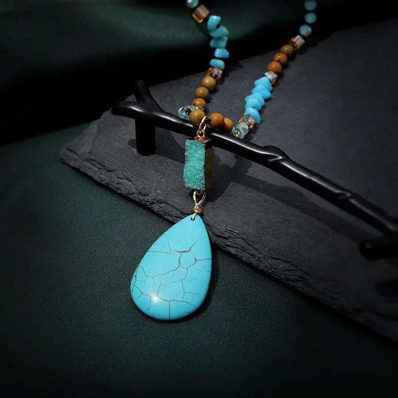 Blue turquoise heart-shaped pendant necklace with water drop silhouette on 81cm ball bead chain