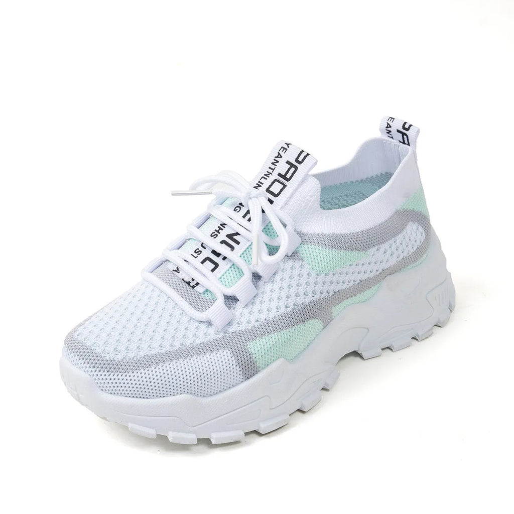 Women's Flyknit mesh sneakers in grey and white, showcasing the breathable upper and flat rubber sole.