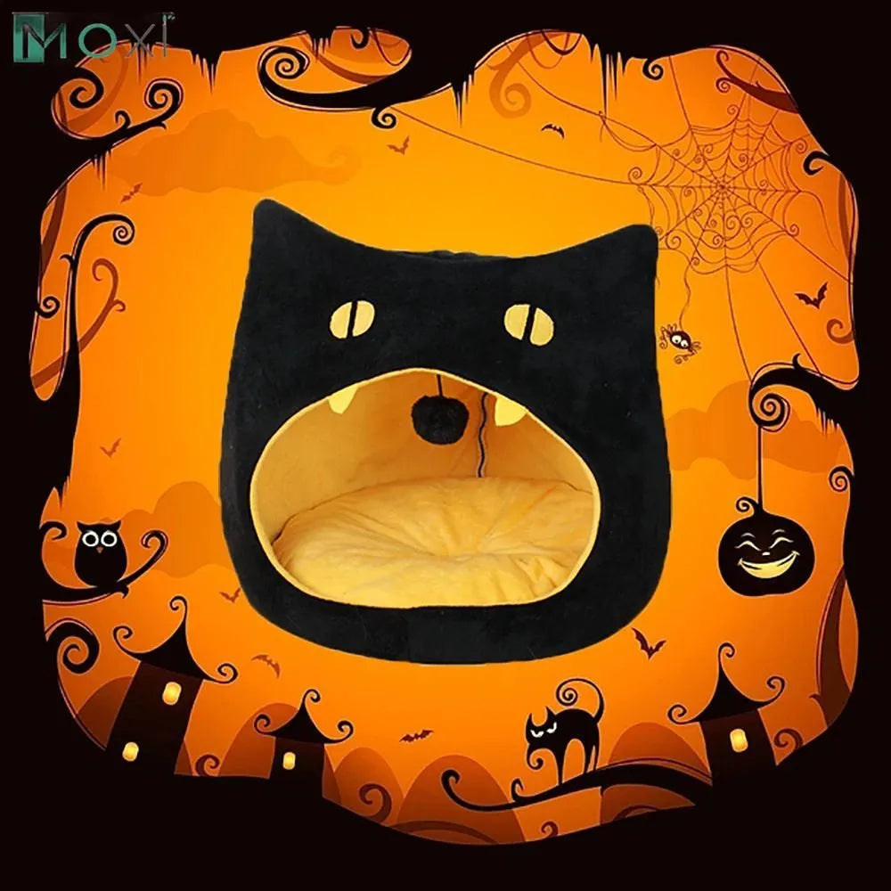 Grey covered cat cave pet bed with cat face design and anti-slip bottom.