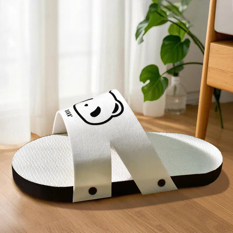 White corrugated paper cat scratch board measuring 30cm long with slipper style design