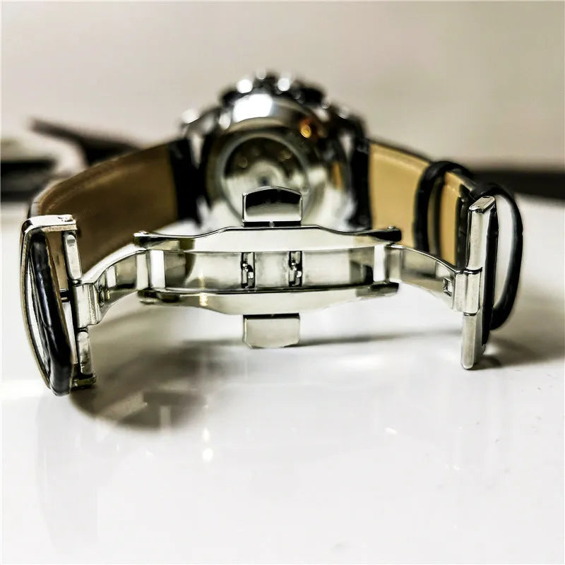 Men's automatic mechanical watch with metal case in various colour options showing 12mm thickness profile