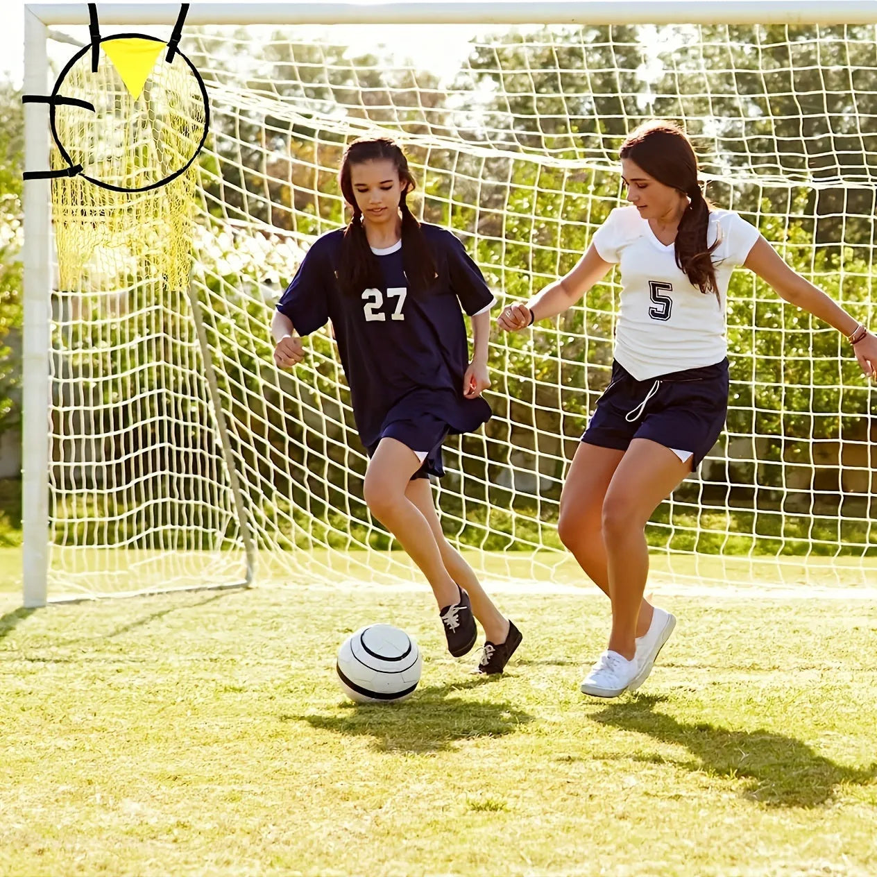 Portable aluminium frame soccer training goal net set up on grass