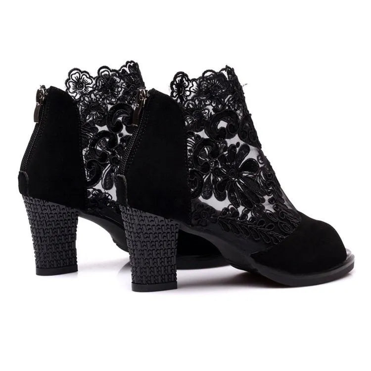 Lucyever women's gladiator sandals with square heel, lace upper, flower pattern, and zip closure in black colour