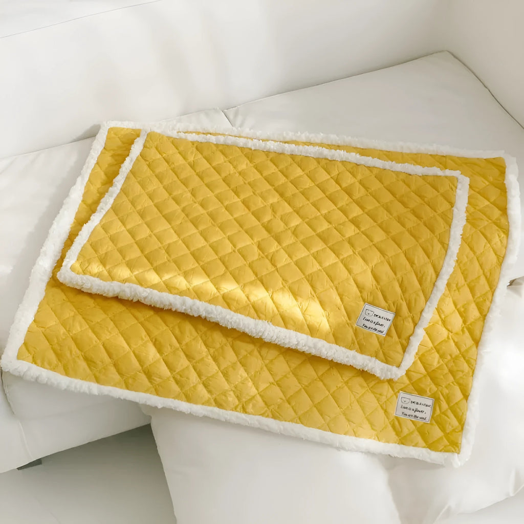 Blue warm terry cloth pet blanket for cats, shown flat with size options M, L, and XL.