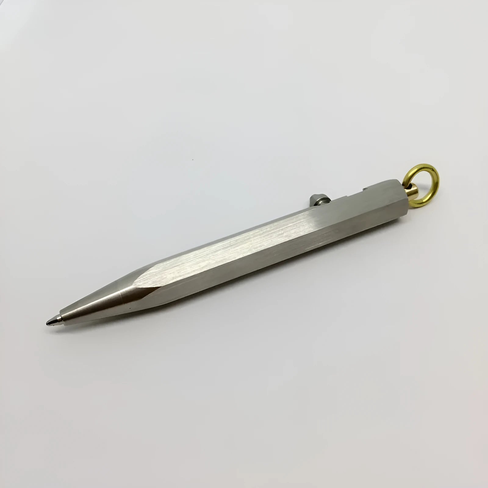 Six-sided stainless steel brass keychain pen in chrome colour