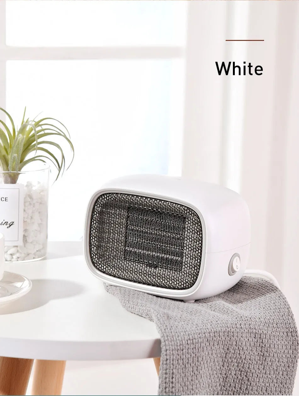 Mini home heater in green, white, or yellow with PTC ceramic heating, 500W power, and compact 158mm dimensions