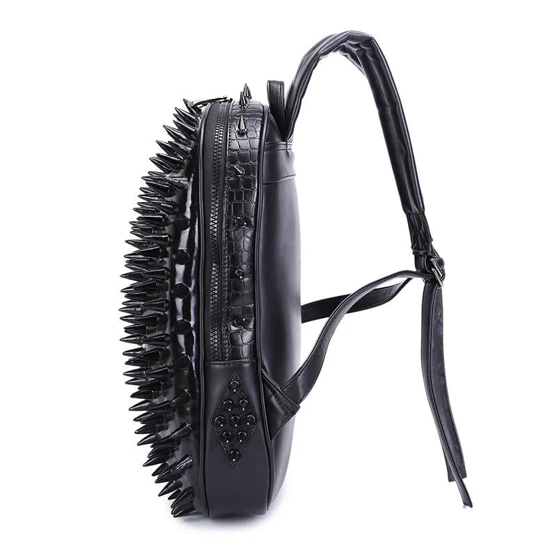 Black oval women's punk style backpack made of PU leather with hollow out details and air cushion straps.