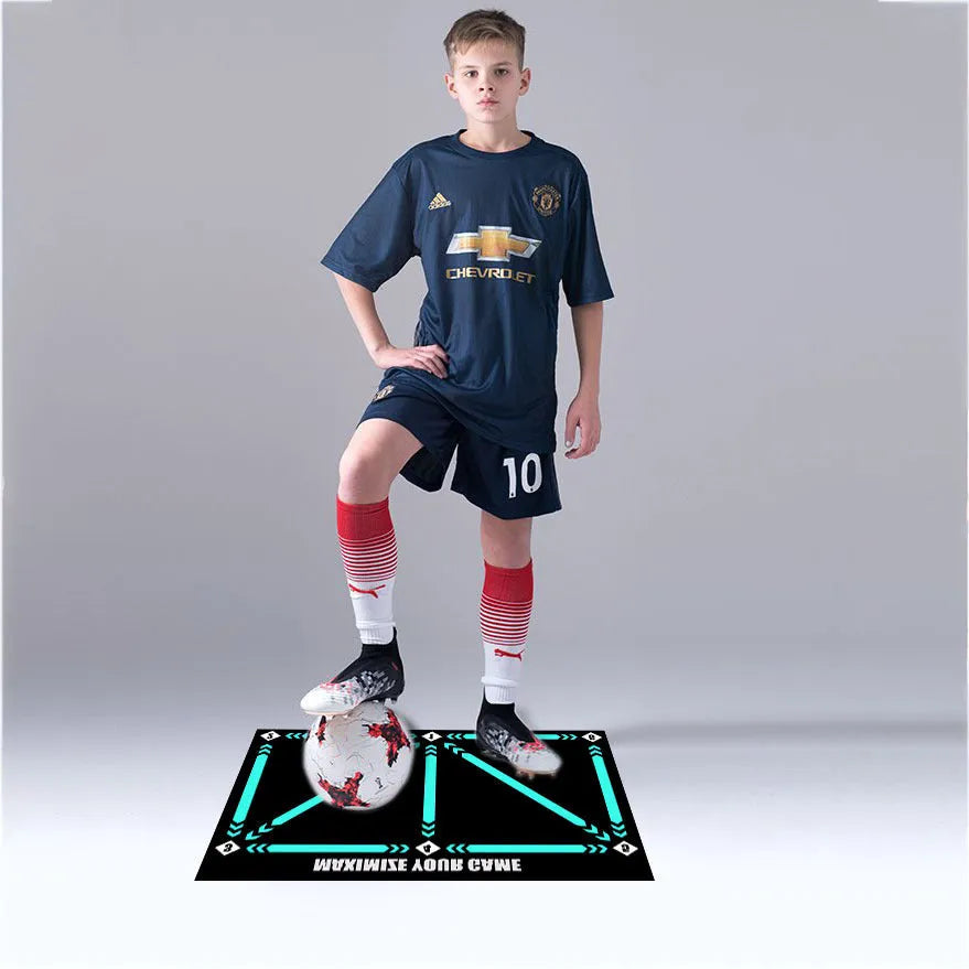 Black football training mat measuring 60x90cm with non-slip backing for ball control drills