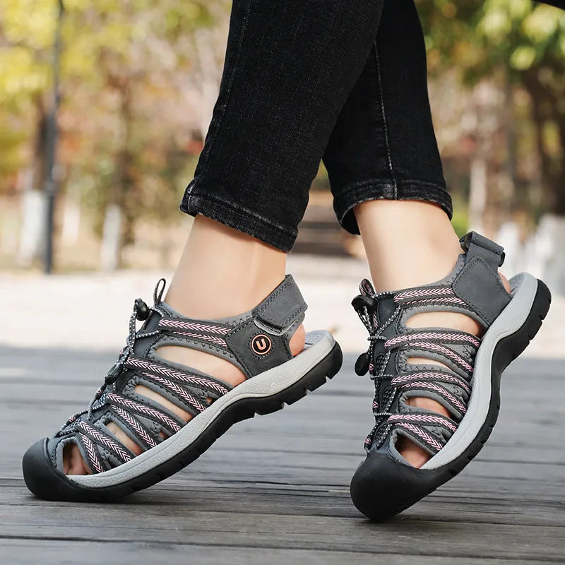 Women's black leather mesh sandals with elastic band and rubber sole, shown in size 38.