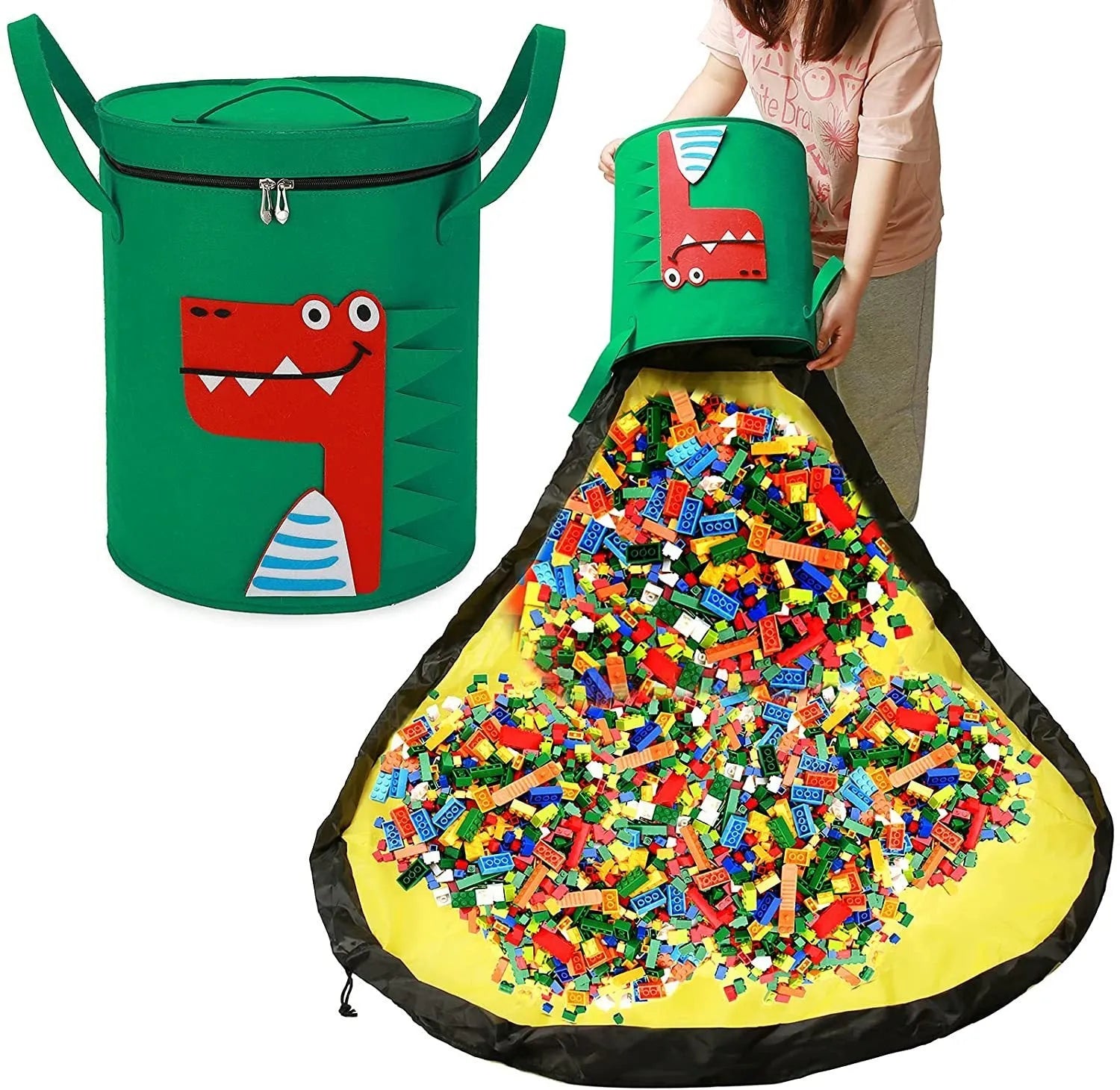 Green felt storage cube with pull rope, unfolded as a play mat on a living room floor