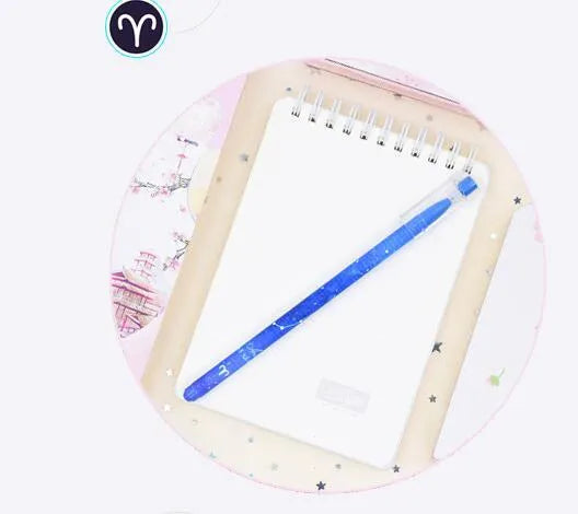 Box containing 12 constellation-themed plastic gel pens with quick-drying ink