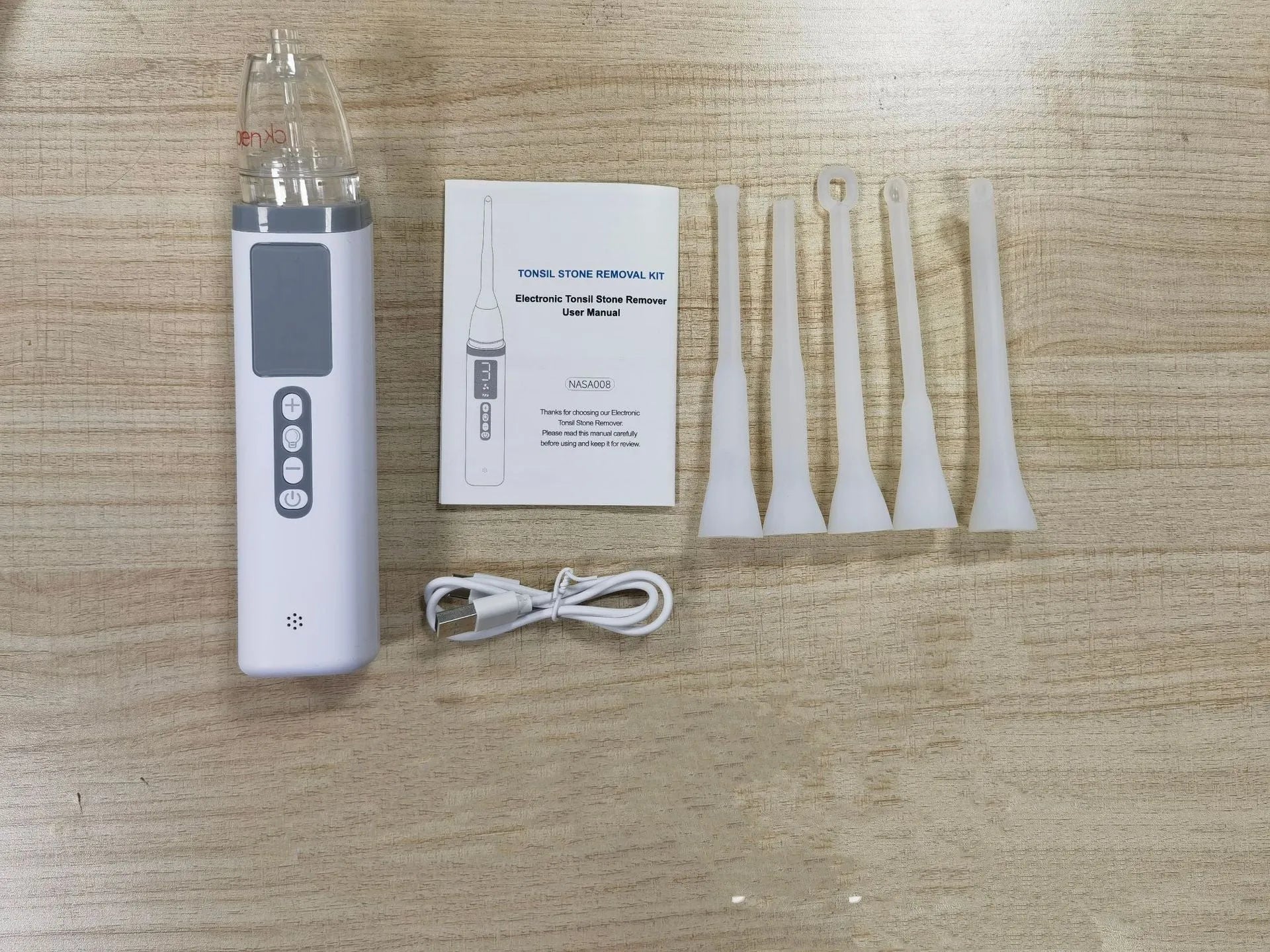 Stainless steel tonsil stone extractor oral cleaning tool in milky white colour