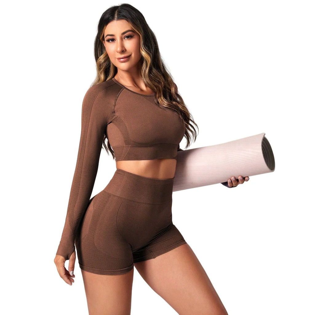 Women's high-waisted yoga suit in nylon-spandex blend available in black, brown and purple colours