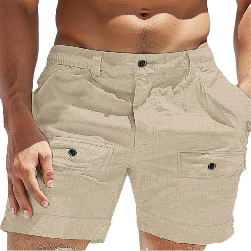 Men's linen shorts with elastic waistband in white colour showing button closure and straight cut design