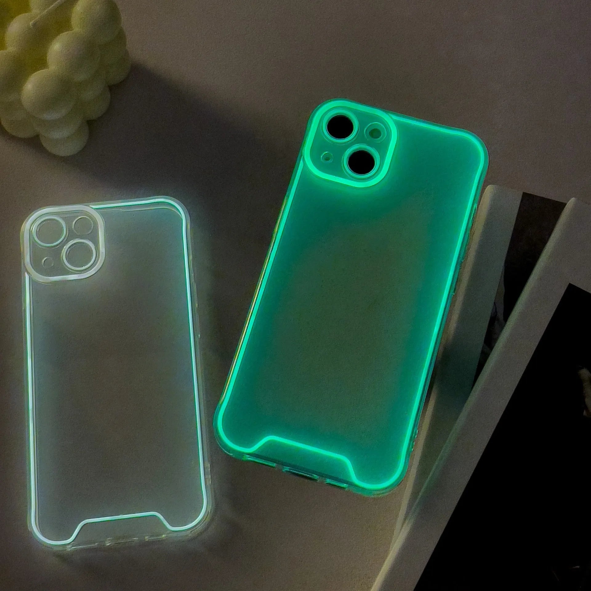 Glow in the dark Christmas phone case for Apple iPhone with soft TPU shell in green, orange, blue, yellow, and pink colours