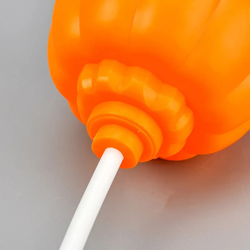 Pumpkin-shaped lamp with USB charging, 22cm tall, emitting yellow or purple light for holiday decor
