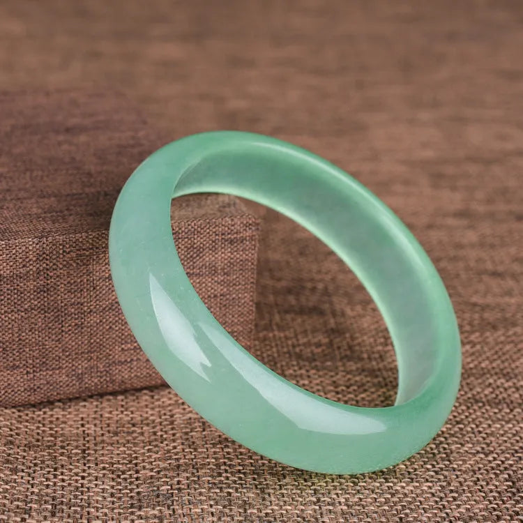 Quartz rock jade bracelet in modern simplicity style showing oil cyan light green colour