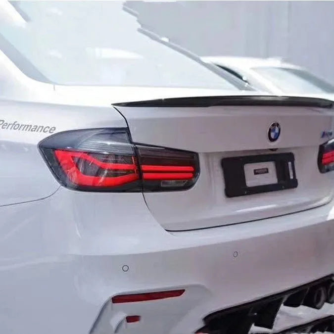 BMW 3 Series tail light assembly in red or smoked black finish with modified streamer LED design