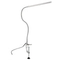 Silver aluminium alloy USB LED nail lamp with long arm and clip-on base, lit with bright white light.