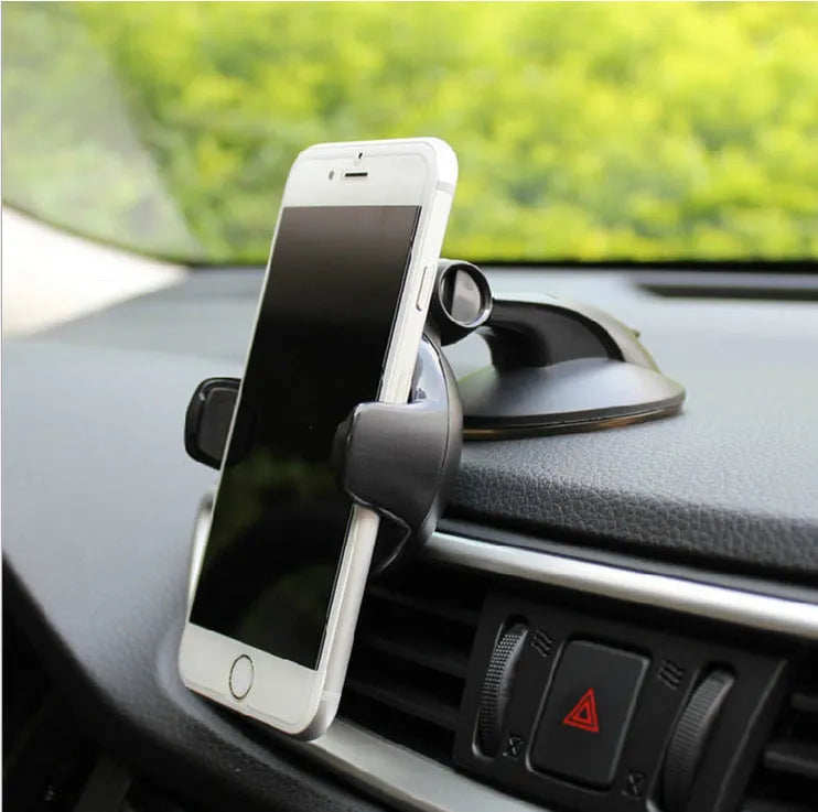 Suction cup car phone holder in black or blue for phones 5cm to 8cm wide, mounted on glass or dashboard.