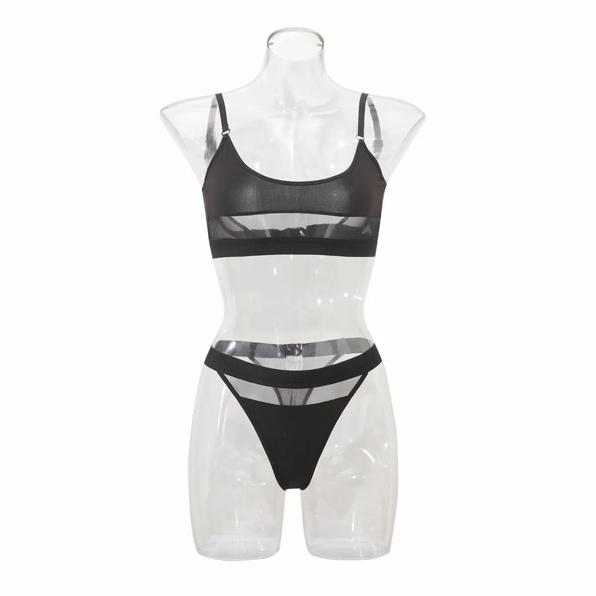 Women's black full cup bra and panty set with adjustable straps on a white background.