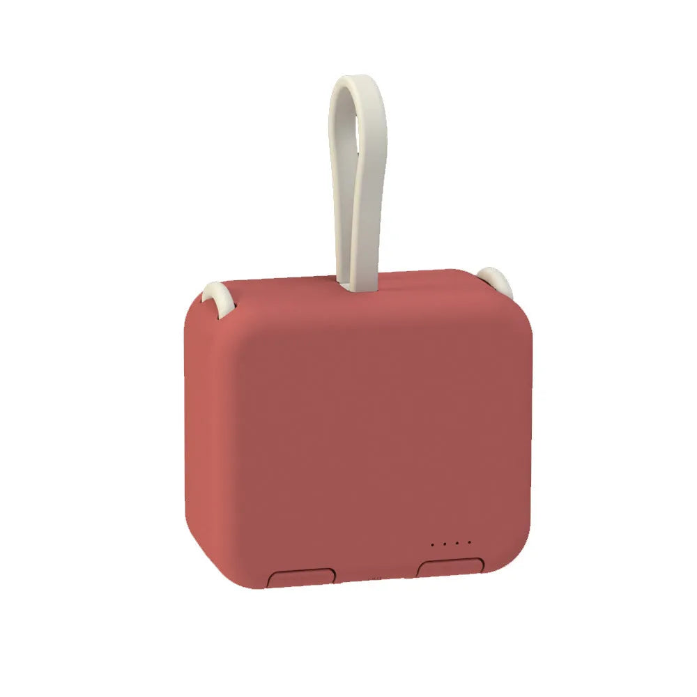 Handbag back clip power bank in four colours showing clip mechanism and dual charging ports