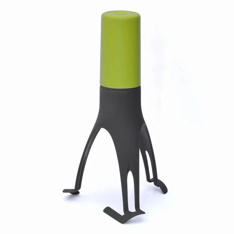 Green Uutensil Stirr automatic pot stirrer, a 22.2cm tall kitchen gadget for sauces and soups.