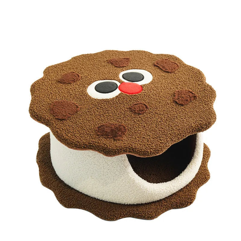 Khaki coloured cat nest bed shaped like a sandwich cookie, showing enclosed house design.