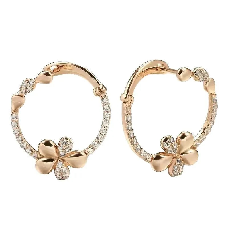 A pair of round geometric hoop earrings for women made from electroplated copper.