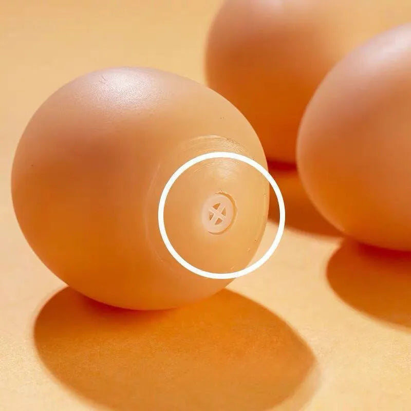 Simulation egg-shaped dog chew toy with squeaker sound for dental play
