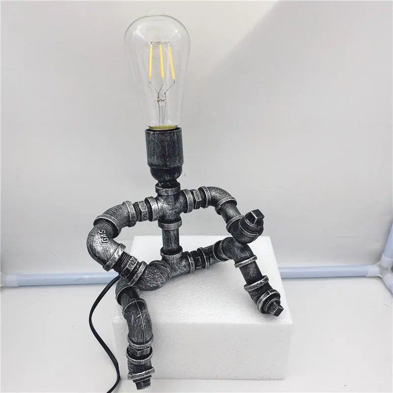 Iron pipe industrial retro table lamp with customisable water pipe design on wooden desk