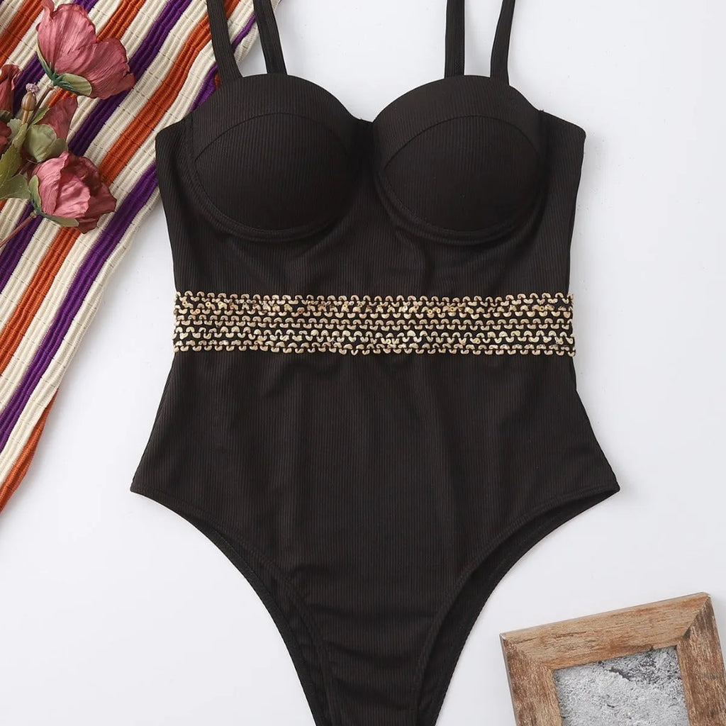 Black one-piece swimsuit with adjustable shoulder straps for women in polyester fabric
