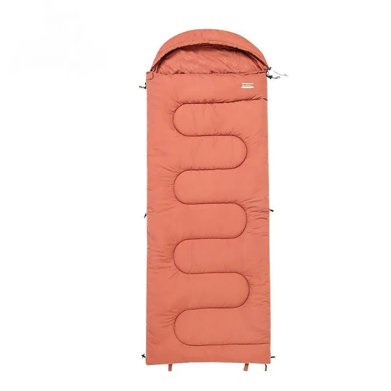 Ochre and olive green cotton sleeping bag with 300g/m² fill, packed to 40cm x 20cm for camping