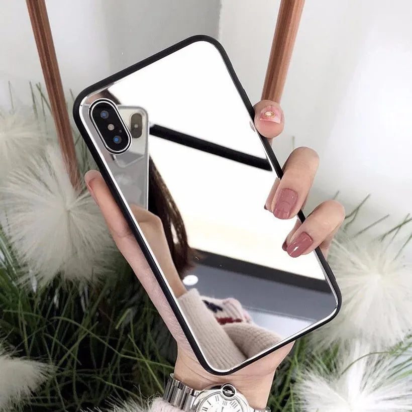 Black iPhone mirror phone case with built-in reflective surface on back, compatible with iPhone 7 Plus, 8 Plus, and X models