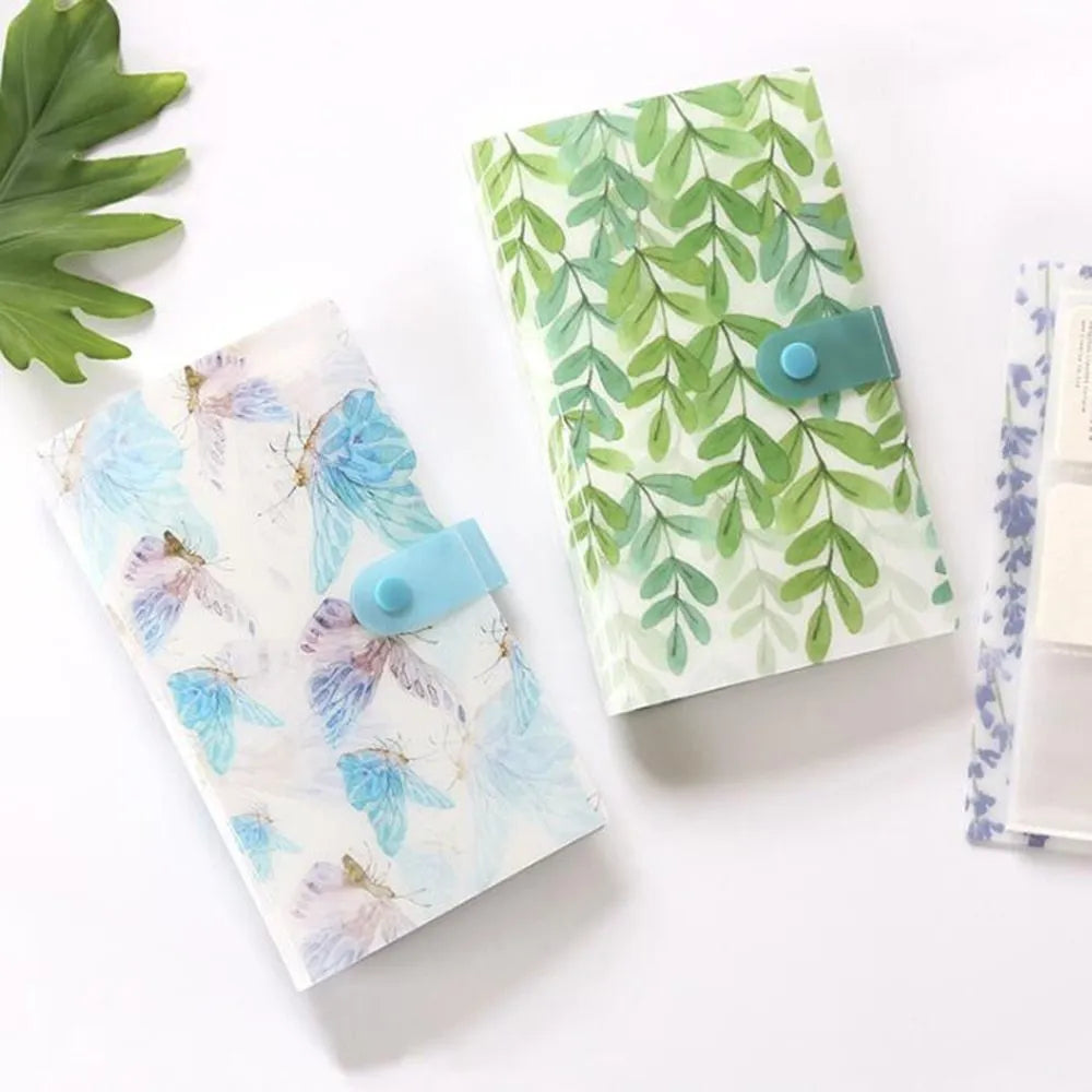Blue PVC and PP business card holder book with protective shell showing insert pockets and smile logo.