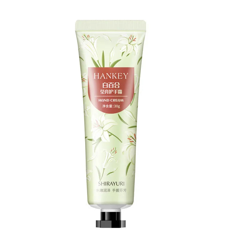 30g tube of fruit-scented hand cream shown with avocado, rose, and strawberry variant labels.