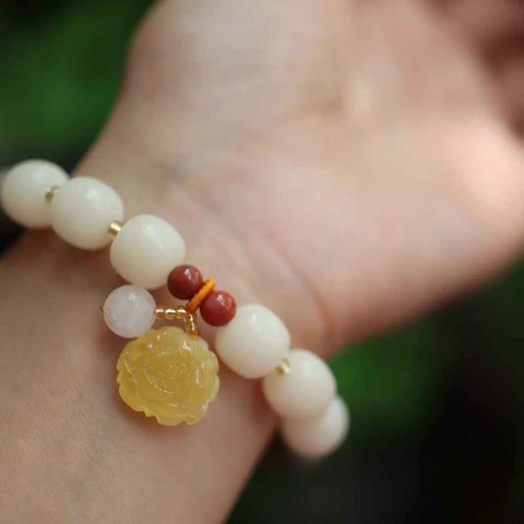 Gradient white jade bodhi bracelet with beeswax lotus pendant, 10mm flower beads