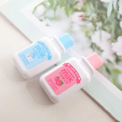 Creative bottle-shaped correction tape with decorative patterns showing curved comfortable design
