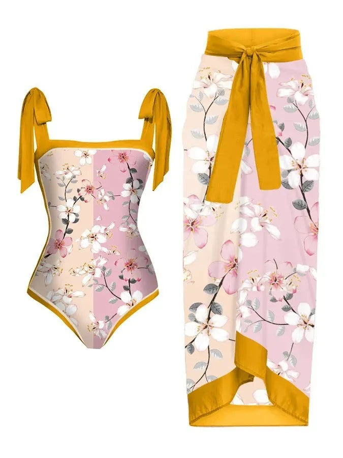 Women's printed chiffon swimsuit with matching hip skirt in floral pattern