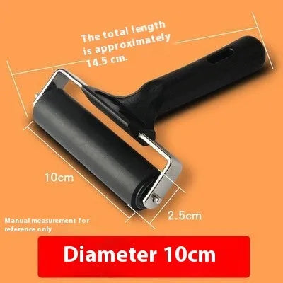 Black rubber paint roller tool with metal bracket, 6cm wide, for wall painting.