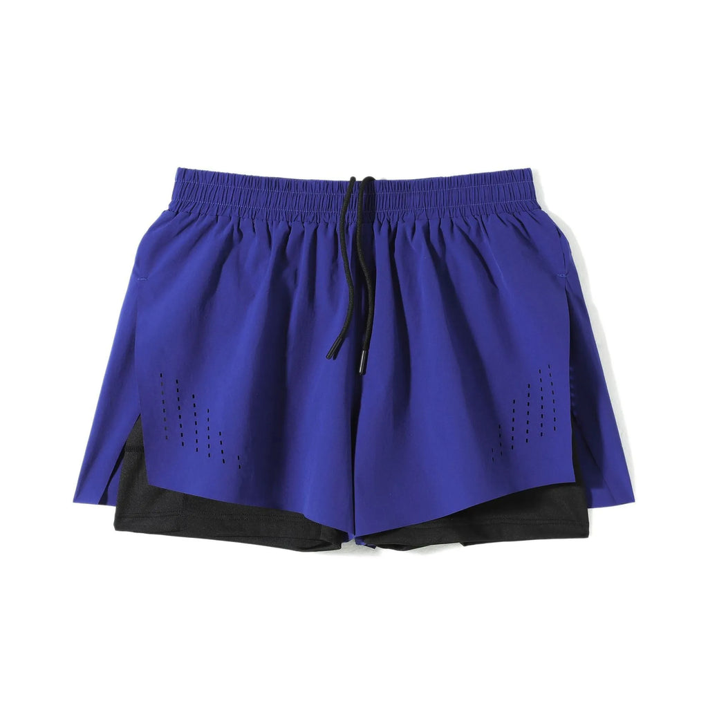 Men's straight-cut nylon sports shorts with side slits, shown in turmeric yellow, for summer athletic wear.